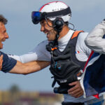 Quentin Delapierre, driver of France SailGP Team, celebrates with Thierry Douillard, France SailGP Team coach, after France SailGP Team win the Spain Sail Grand Prix in Cadiz, Andalusia, Spain. 25th September 2022. Photo: Bob Martin for SailGP. Handout image supplied by SailGP