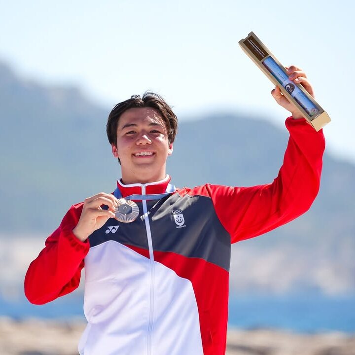 #TeamSG’s @maximilianmaeder smiling brighter than the sun with his medal and the Singapore flag
