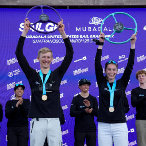 Inspire WASZP Grand Final champions Sean Herbert, New Zealand and Hattie Rogers celebrate on Race Day 2 of San Francisco SailGP, Season 2 in San Francisco, USA. 27th March 2022. Photo: Bob Martin for SailGP. Handout image supplied by SailGP