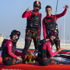 Spain SailGP Team co-helmed by Florian Trittel and Phil Robertson wave to the crowds after celebrating winning Race 2 on Race Day 1 at Spain SailGP, Event 6, Season 2 in Cadiz, Andalucia, Spain. 9th October 2021. Photo: Bob Martin for SailGP. Handout image supplied by SailGP